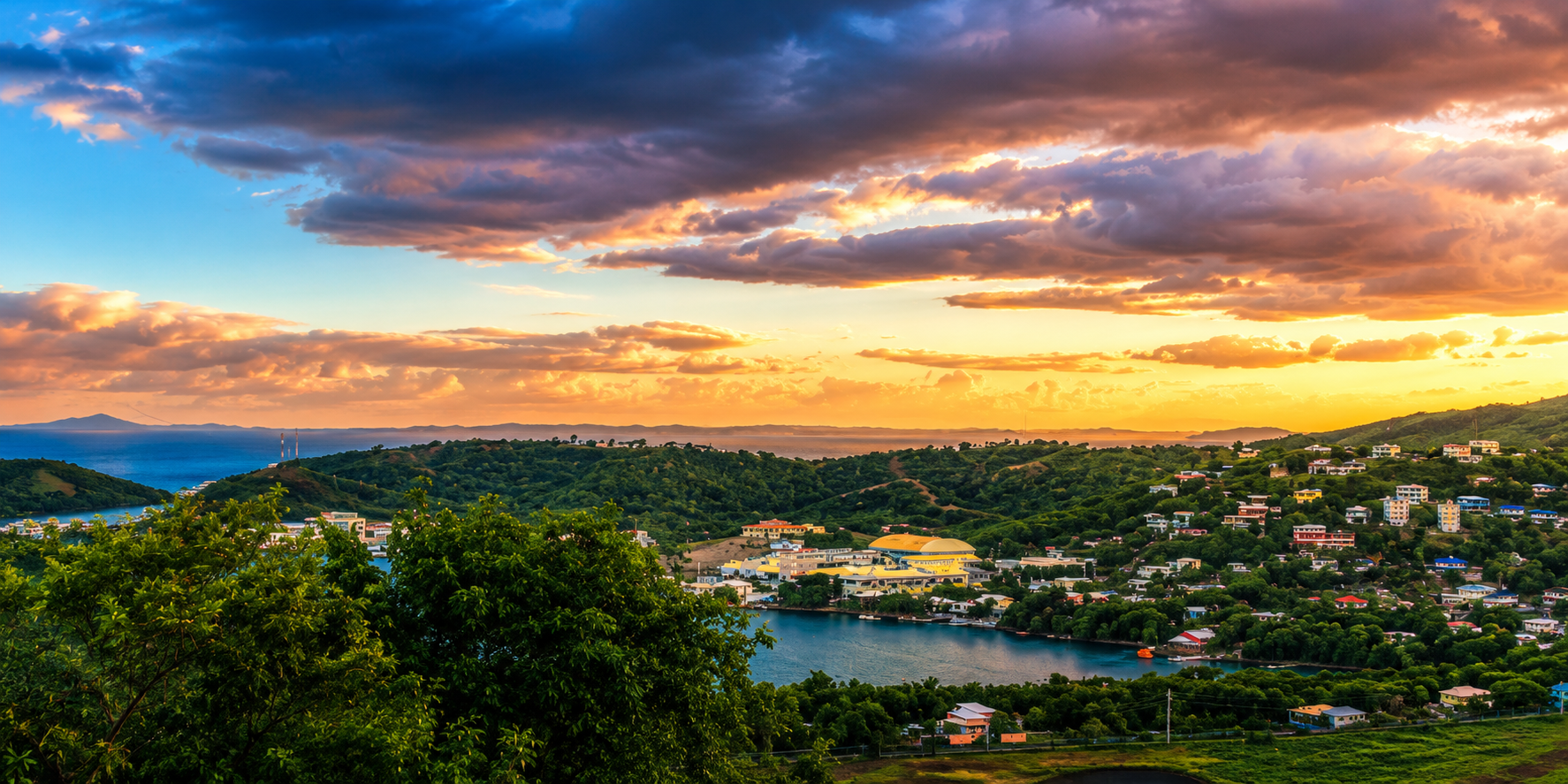 Panoramic sunset over Culebra's hills, town and Ensenada Honda bay